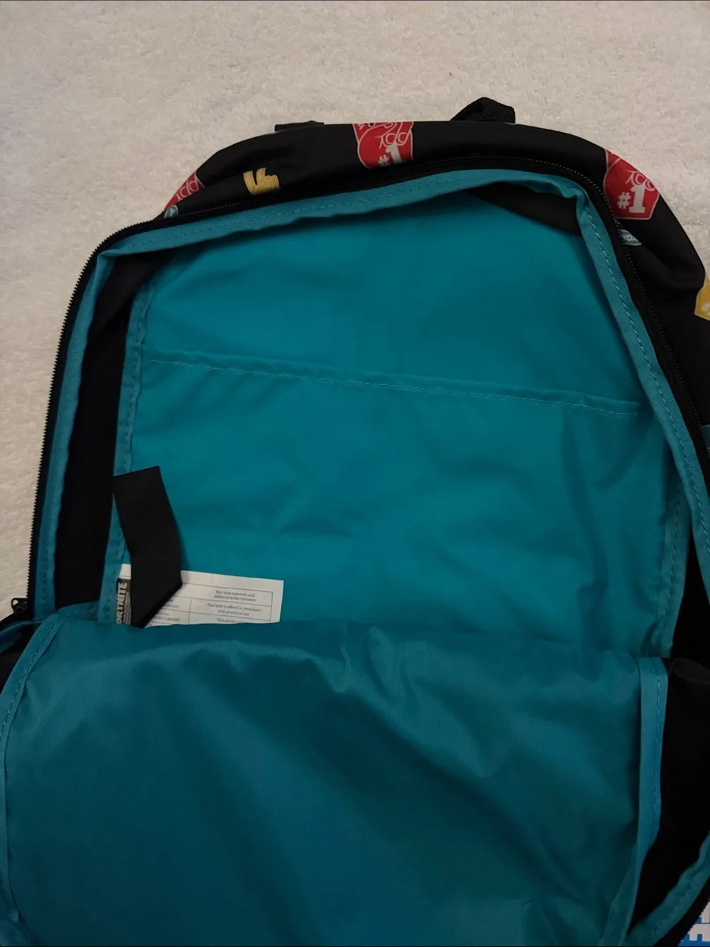 Fortnite Black Backpack with Multi-Color Peace Sign Print. NWT